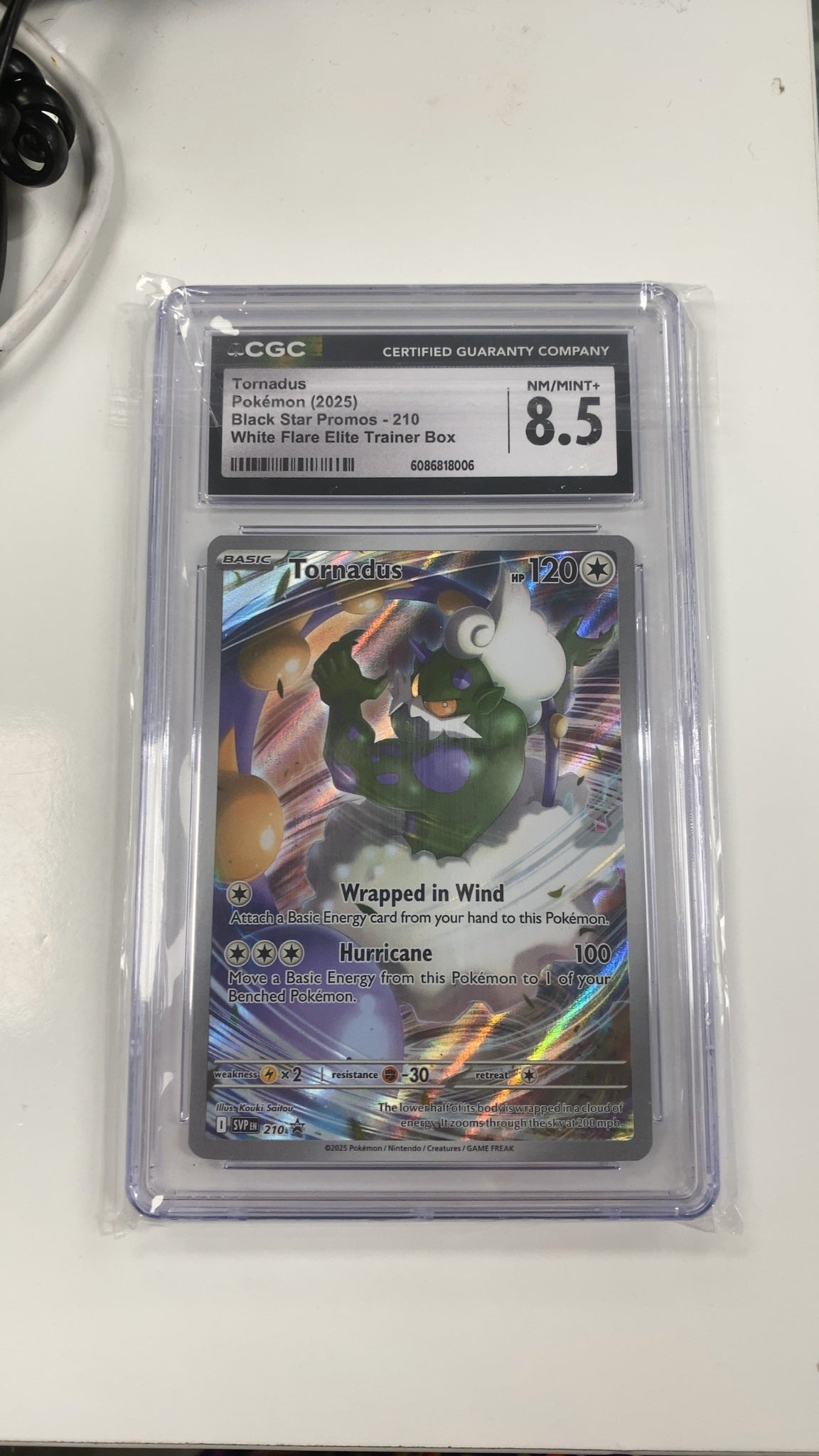 Tornadus - Pokemon Promo 210 (GRADED 8) — trade-in photo